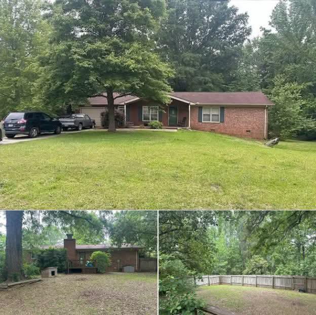 3-Bedroom Brick Home on 52 Acres with Fireplace, Fenced Yard, and Development Potential in Greenwood, South Carolina