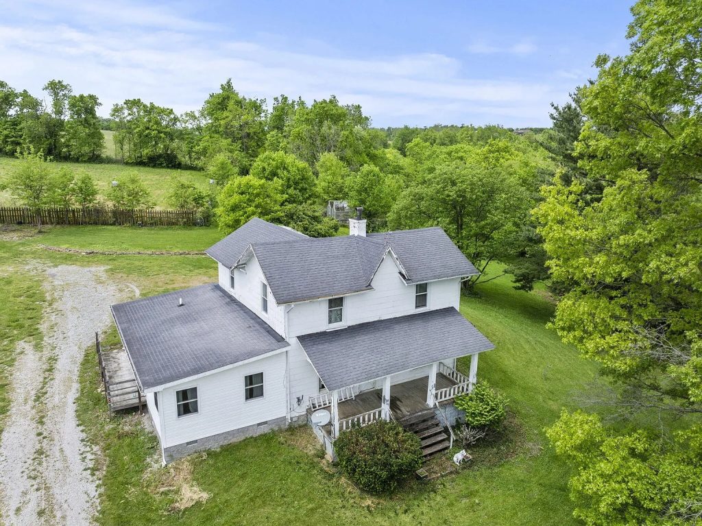 10.4 Acres in Kentucky! A Charming 4-Bedroom Farmhouse With Rolling Pastures and Endless Potential!