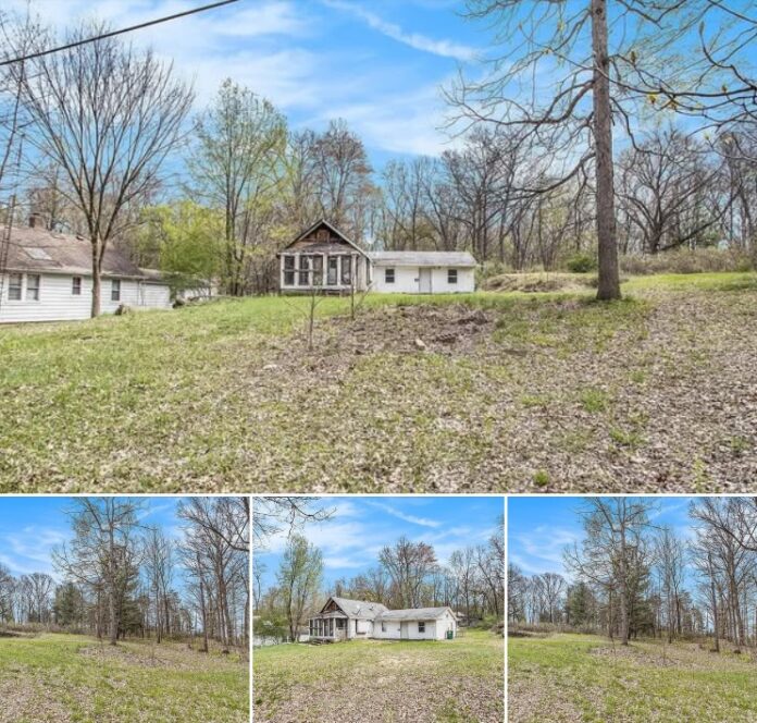 1.6 Acres With Two Living Units! Fixer-Upper Offers Garage, Workshop and Rental Potential