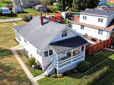 Refreshed Cape Cod in Monongahela, Pennsylvania on 0.11 Acres — 3 Bedrooms, 1.5 Bathrooms, 1,410 Sq Ft, Sunroom, and New Heating System for $189,000