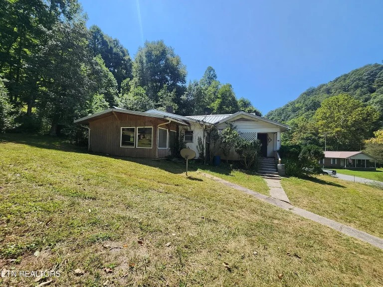 19.85 Acres in Virginia with a 3-Bedroom Fixer-Upper, Workshop, and Mountain Views