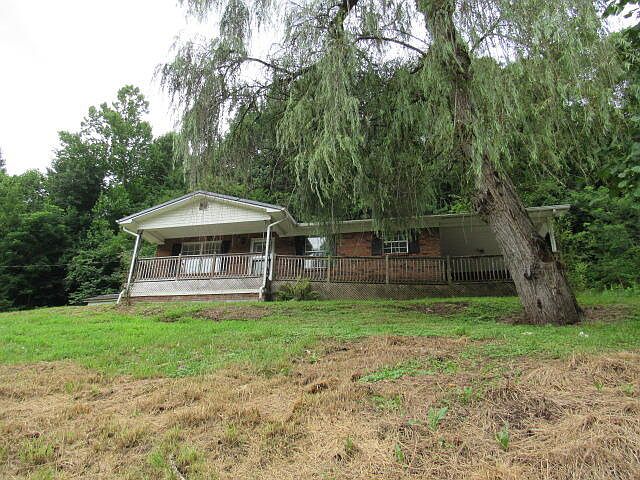 KENTUCKY COUNTRY LIVING FOR $89,900! 3-bedroom brick ranch on 25 wooded acres with privacy and space!