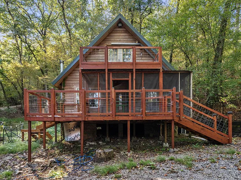 Arkansas Riverfront Cabin Auction on 10.3 Acres With an A-Frame Log Home and 705 Feet of River Frontage