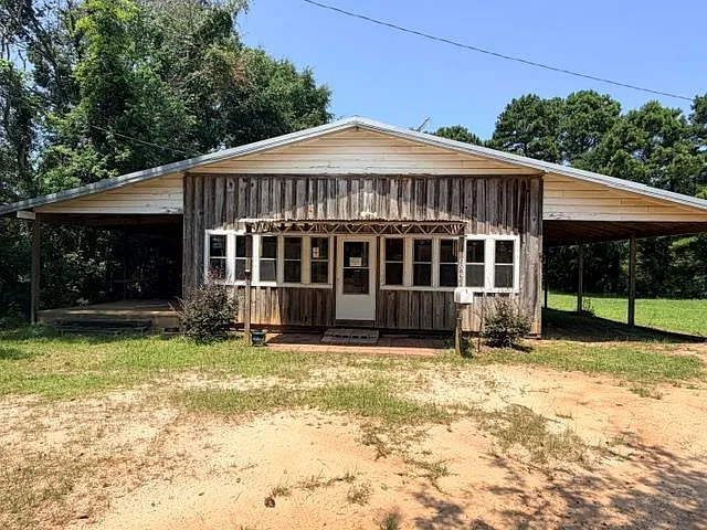 Affordable Alabama Log Cabin With Nearly an Acre, Enclosed Porches & Country Charm