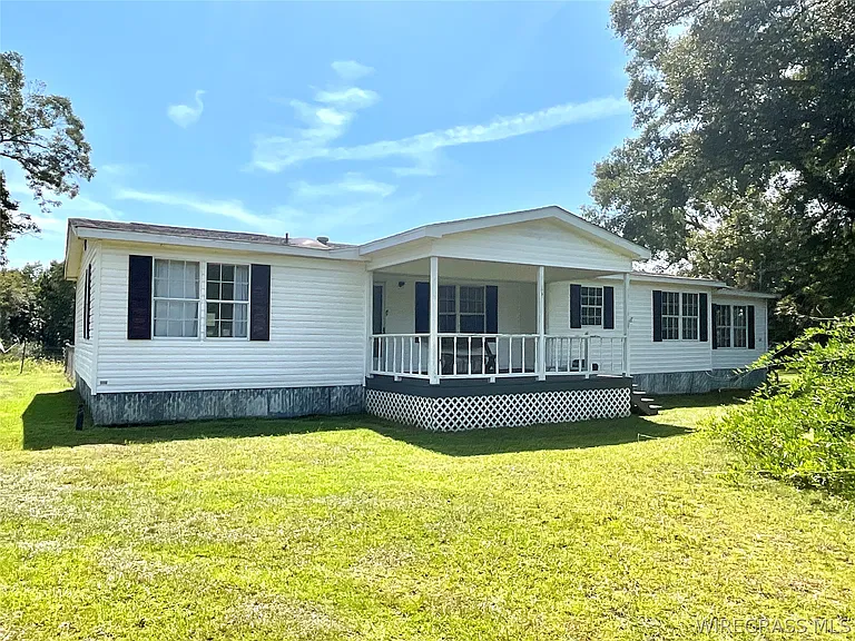 Peaceful One-Acre Country Home Near Andalusia With Spacious Rooms, Workshop and Covered Outdoor Living