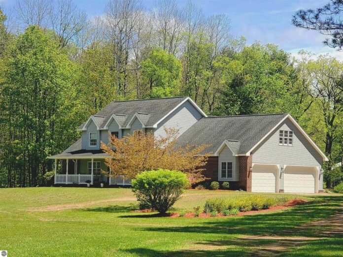 80 Private Acres with Beautiful Farmhouse, Creek, Bridge, and Scenic Trails
