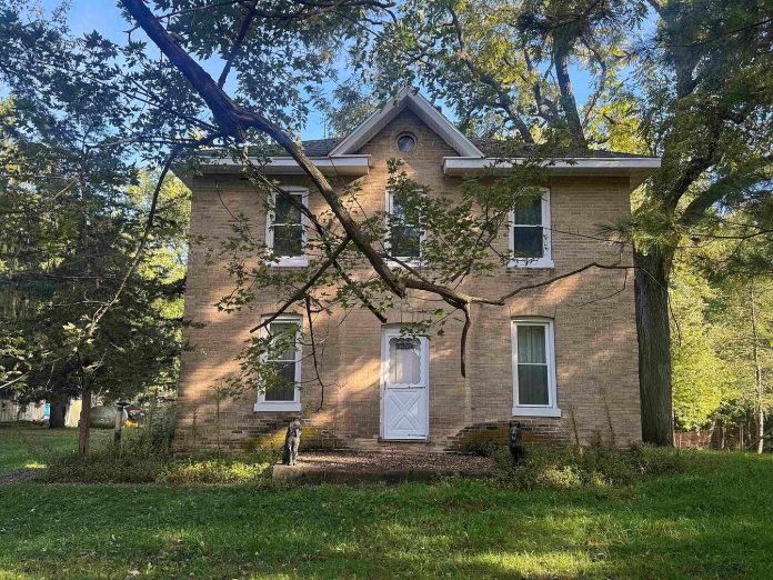 12.49 Acres in Wisconsin With a 3-Bedroom Farmhouse, Garage and Several Outbuildings – Auction Starts at $100,000