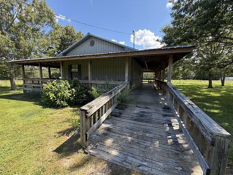 Charming Two-Acre Country Retreat With Wraparound Porch and Easy One-Level Living