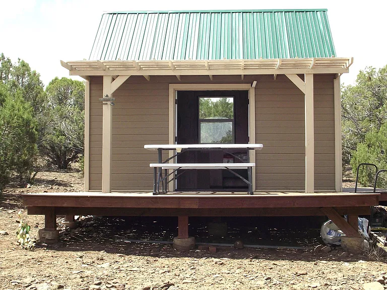 Arizona Hunting Cabin on 40 Acres With Mountain Views and a Wraparound Porch