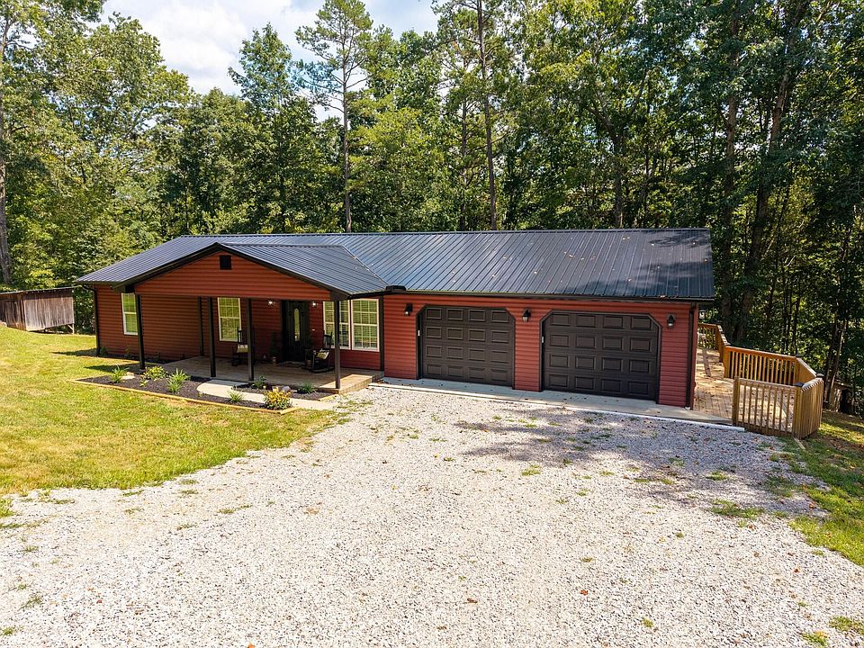 Beautifully Renovated 3-Bedroom Country Home with Modern Upgrades, Garage & Wraparound Deck