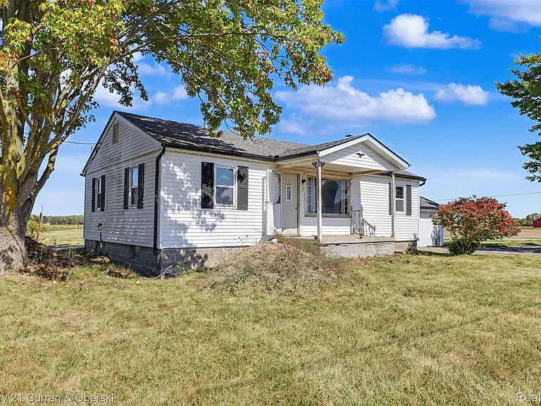 Rare 7-Acre Country Property With Renovation Potential and Large Pole Barn