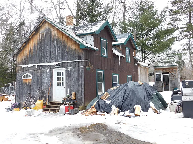 Secluded 3-Bedroom Maine Home With 1 Acre, Stream Views and Country Privacy — $75,000