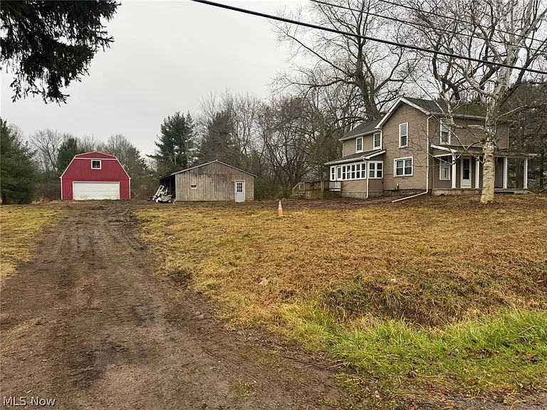 Cortland Farmhouse on 2.59 Acres With Large Barn and Endless Potential