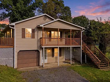 Spacious Mansfield Retreat on 0.66 Acres with Wraparound Porch, Garage & Finished Lower Level