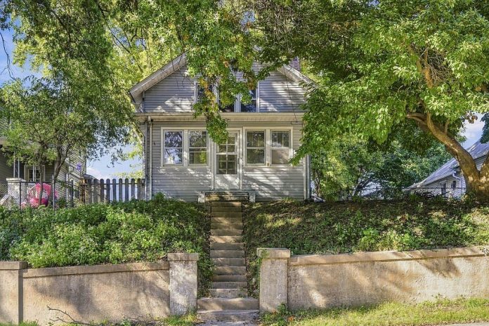 Only $80,000! Charming 1891 Illinois Home With Hardwood Floors, Fireplace, Fenced Yard and a 2-Car Garage!