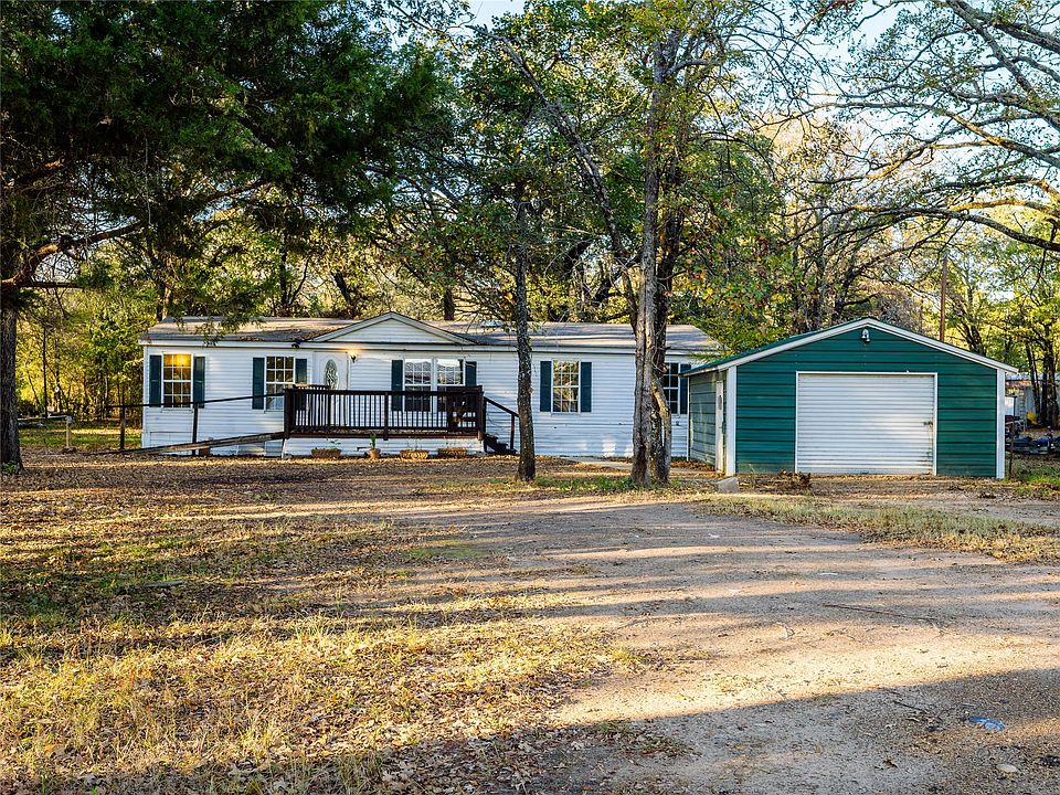 Texas Wooded-Acre Retreat With 3 Bedrooms, 2 Living Areas and RV Parking