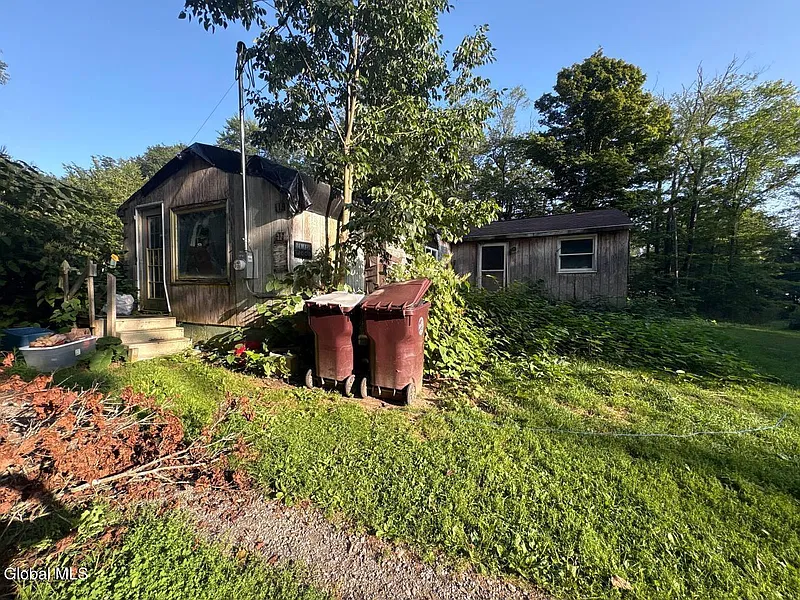 $65,000 New York Fixer-Upper With 3 Bedrooms, 4.5 Acres & a Detached 2-Car Garage