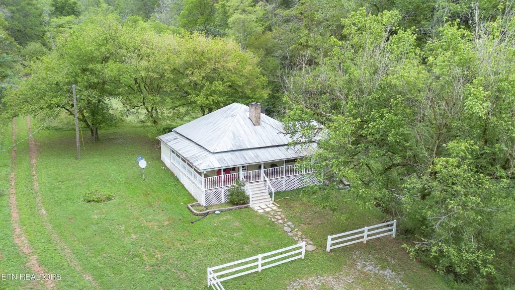 29 Acres in Tennessee with a Renovated 1940 Home, Barn, Greenhouse, and Stream