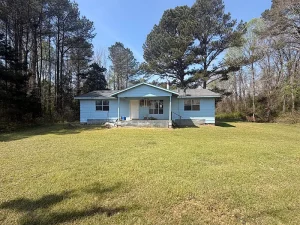 MISSISSIPPI RETREAT ON 5.3 WOODED ACRES! 3 bedrooms, peaceful surroundings, and plenty of room to enjoy the country!