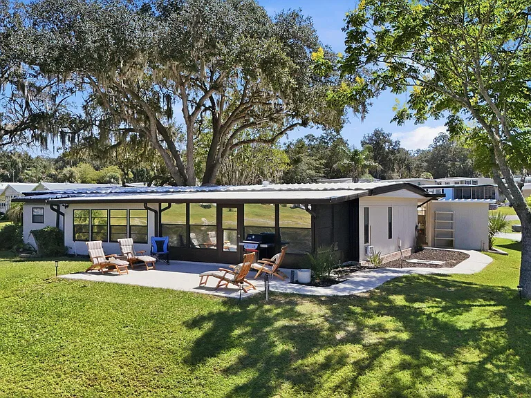 Affordable Florida Manufactured Home With a Screened Porch — $29,900