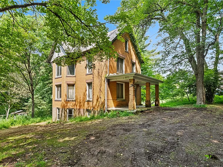 Historic 4-Bedroom Brick Home on 2 Acres With Endless Restoration Possibilities