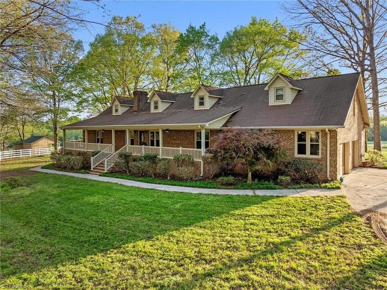 Expansive 76.9-Acre Farm Estate With Spacious Home, Barn and Private Pond