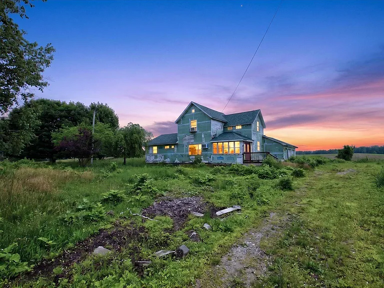 A Country Renovation Opportunity on 7.8 Acres with Endless Possibilities
