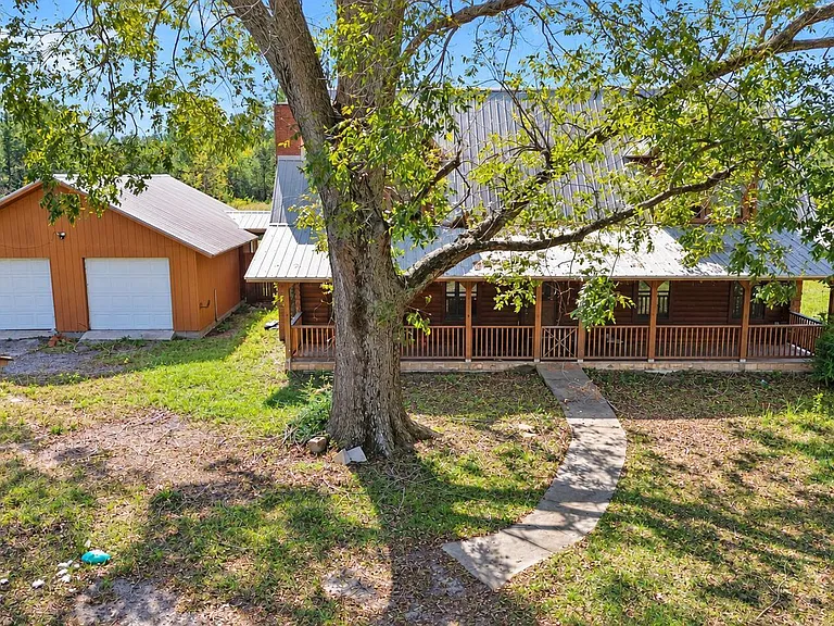 Rustic Florida Log Cabin on 5.87 Acres With a Private Pond — $199,990, 3 Bedrooms, 3 Bathrooms, and 1,804 Sq Ft in Cottondale