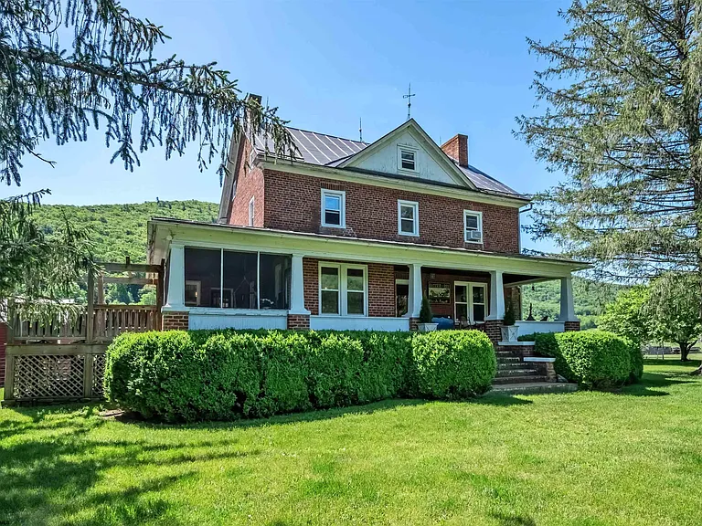 Rare Riverfront Farm Estate on 86.5 Acres With Historic 1812 Home and Mountain Views