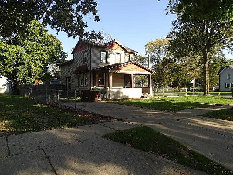 Adrian Four-Bedroom Fixer With Two Baths, Corner-Lot Setting and Garage Potential