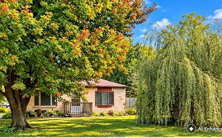 Charming Iowa Home With a Big Yard, Screened Porch & 2-Car Garage