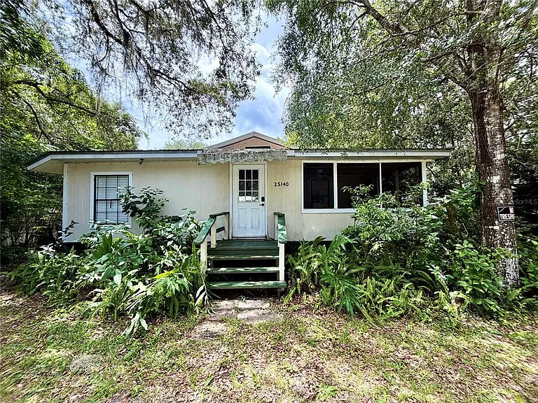A Charming Florida Home With Two Lots Near Lakes and Forests — $125,000