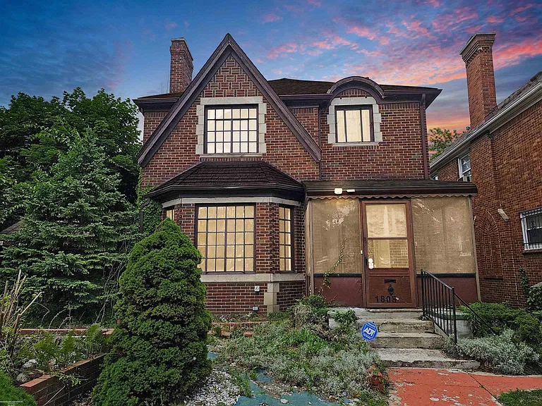 A One-of-a-Kind Detroit Estate with Indoor Pool, Grand Florida Room & Timeless Brick Charm