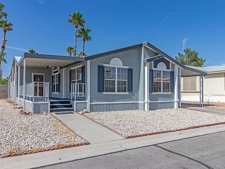 Las Vegas Manufactured Home With a Remodeled Kitchen, Vaulted Ceilings and Covered Parking