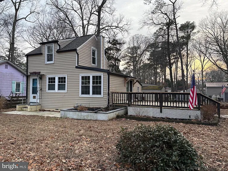 $135,000 Coastal Cottage on 1.86 Acres in Millsboro, Delaware — Detached Garage, Private Outdoor Space, and Easy Access to the Water